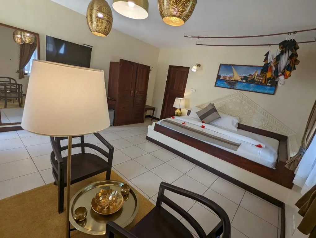 Smiles Beach Hotel Zanzibar bedroom featured in cultural Zanzibar holiday packages